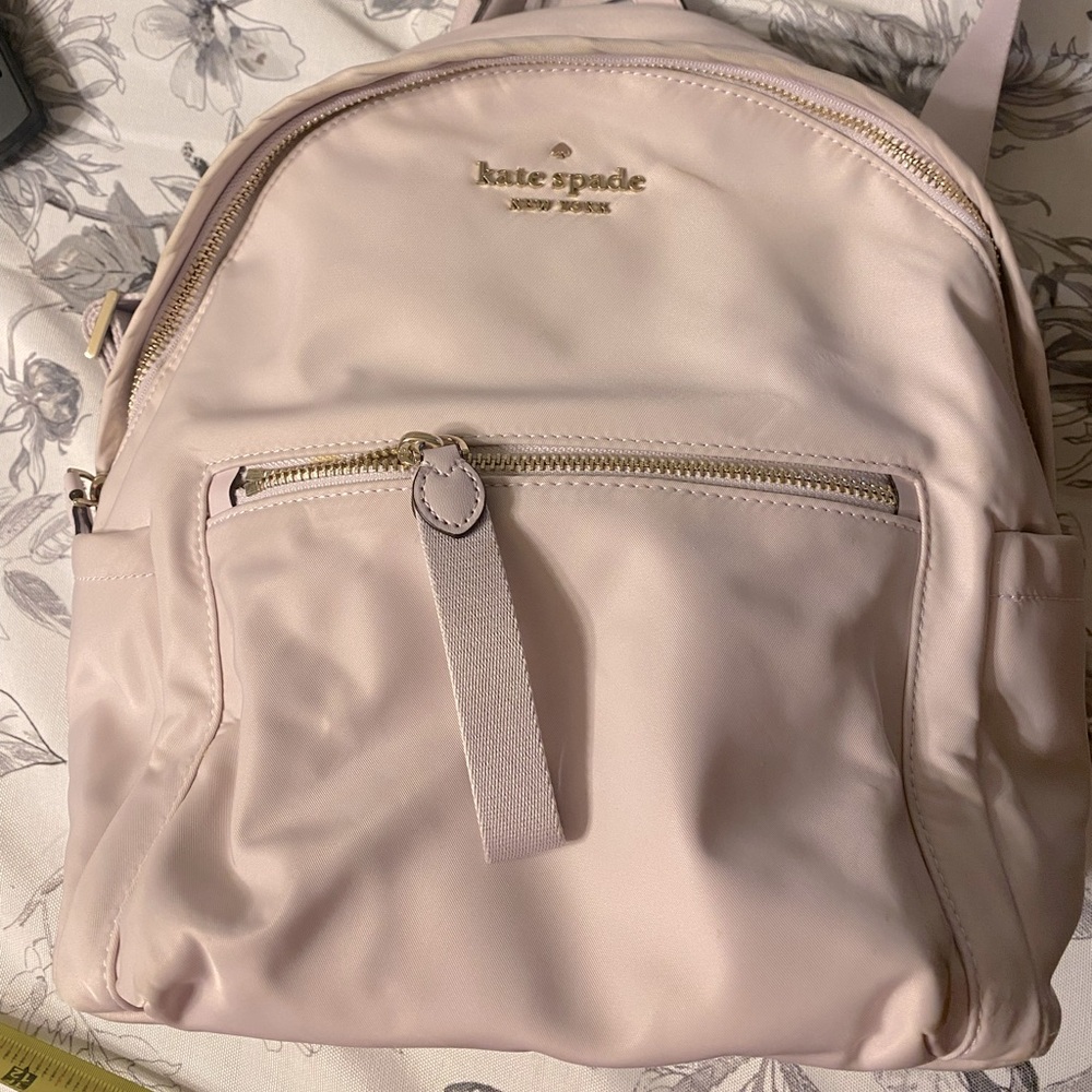 Kate Spade canvas backpack in Tutu pink. Like new used condition